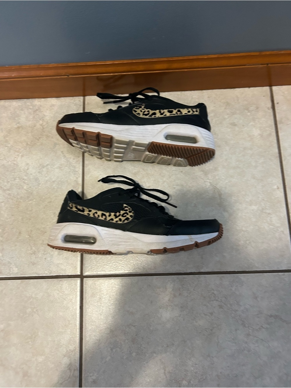 Women’s NIKE Black Sneakers with Leopard Accent and White Midsole
